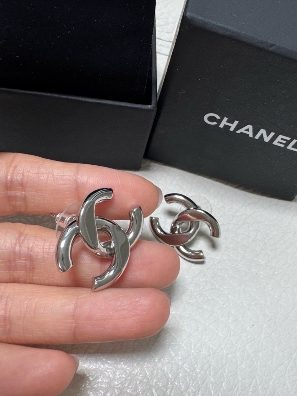 Silver Interlocking CC Logo Clip-On Earrings